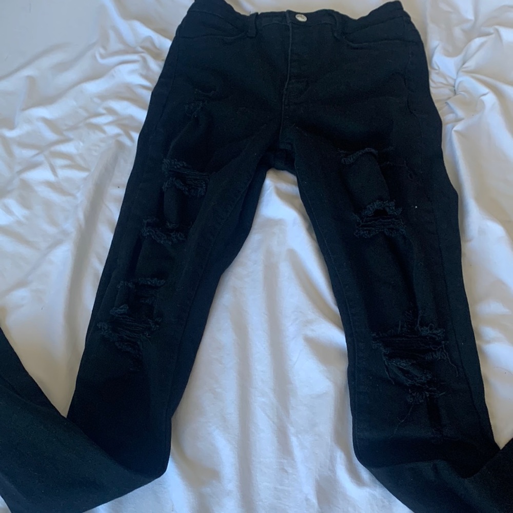 ripped black jeans